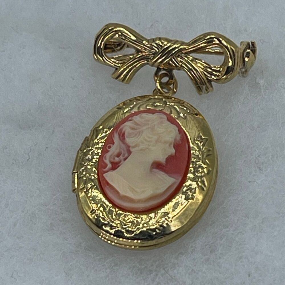 Vintage dangle cameo locket brooch.